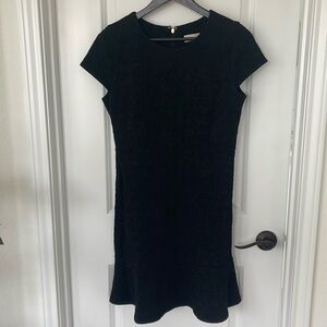 Black michael Kors cocktail dress.